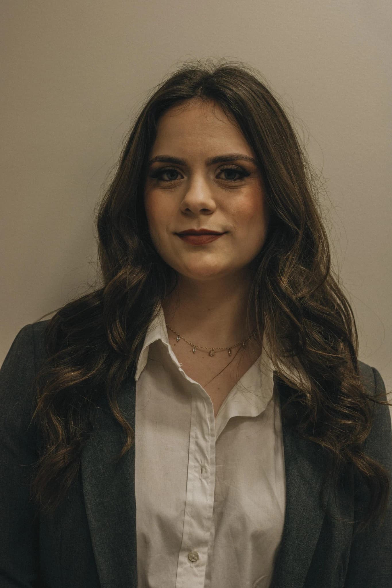 Portrait of Lina Mensah, Head of Data Engineering at SkyMetrics